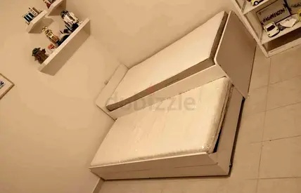 Ikea slakt bed frame with under bed and 2 storage drawers underneath with 2 Ikea mattresses is