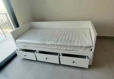 IKEA Hamnes Day bed with 3 storage drawers underneath and with 2 IKEA mattresses is available in exc