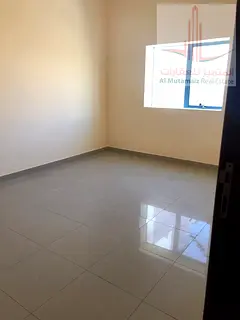 A room and a hall for annual rent, easy access to Dubai and Sharjah, for 23 thousand annually
