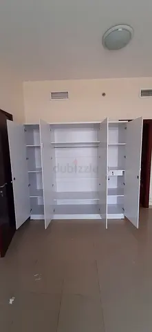 Brand new 4door wardrobe white colour with mirror available