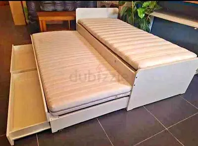 Ikea slakt bed frame with under bed and 2 storage drawers underneath with 2 Ikea mattresses