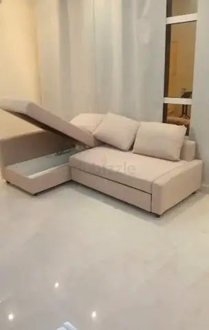 Sofa cum bed with storage