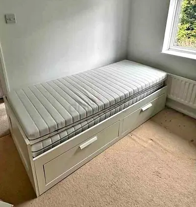 IKEA brimness Day bed with 2 storage drawers underneath and with 2 IKEA mattresses