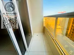 A room and a hall with a balcony overlooking the Al Nuaimiya 1 area, close to Al Hikma School, easy