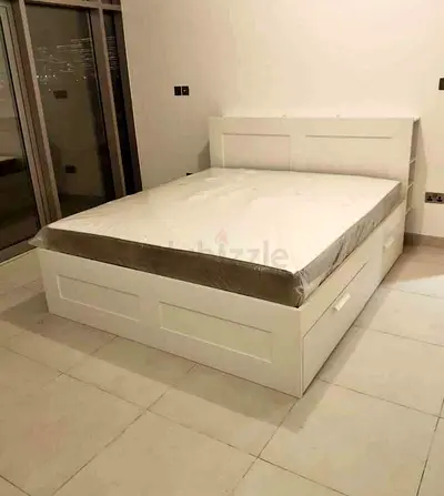 IKEA brimness queen size bed with 4 storage drawers underneath and with  IKEA mattress