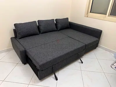 Ikea sofa com bed with storage dark gray color