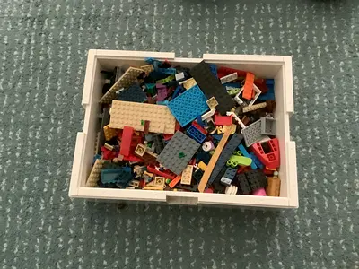 1 large lego boxes with absolutely random pieces.
