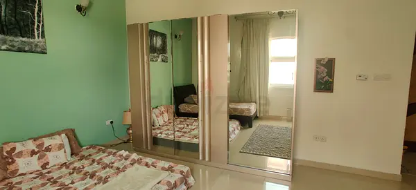 Modern Mirrored Sliding Door Wardrobe – Beige Frame  Gold Handles