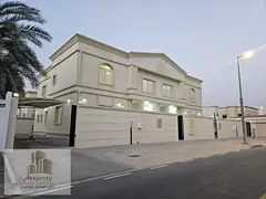 Two attached villas for sale in the Emirate of Sharjah, Al Ramtha area