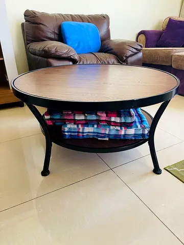 Stylish Round Coffee Table with leather sofa seat