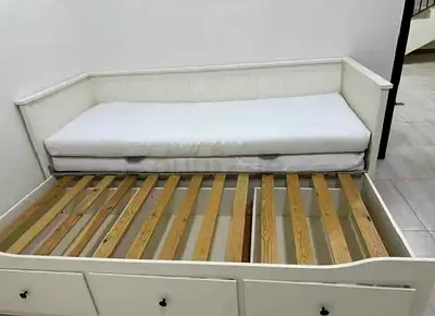 IKEA Hamnes Day bed with 3 storage drawers underneath and with 2 IKEA mattresses is available in exc