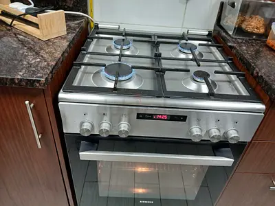 Siemens top four burner gas electric oven size 60cm