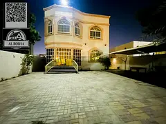 Villa for rent in Ajman Al Muwaihat 3 on the corner of two streets, beautiful location, payment faci