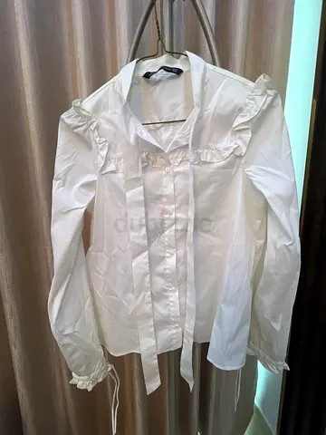 Elegant White Blouse with Ruffled Sleeves