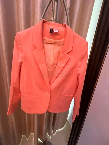 Chic Coral Blazer for Stylish Occasions