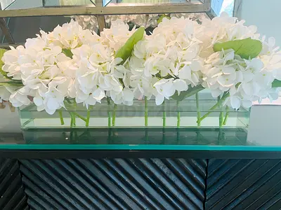 Elegant White Hydrangea Floral Arrangement.  A symbol of gratitude and grace, this dainty hydrangea
