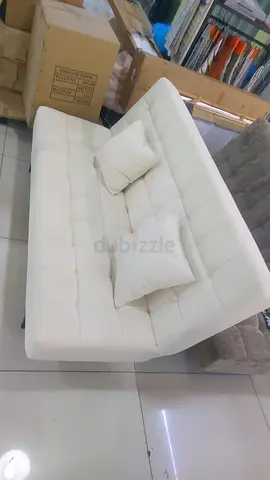 Stylish Cream Sofa bed with Cushions - Perfect for Any Living Space