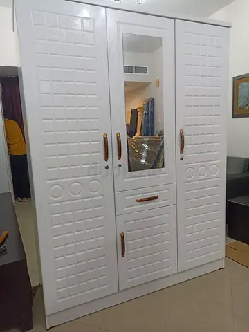 Stylish White Wardrobe with Mirrors and Storage Drawers