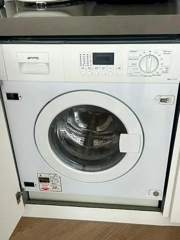 Smeg built in washer dryer combo 7/4