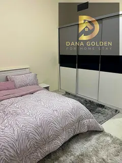 Room and hall for rent in Al Taawun