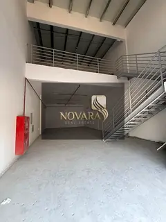 A spacious and fully equipped warehouse for rent in Al Jurf Industrial Area 1, with a total area of