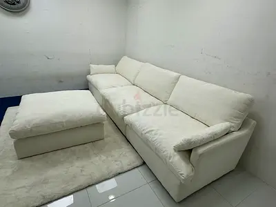 Feather  filled modular sofa with footstool