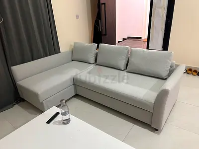 IKEA Holmsund L-shaped sofa-bed with storage
