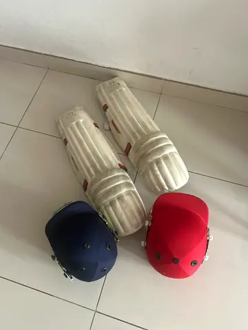Cricket pad and helmet