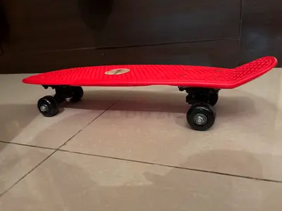 Red Plastic Skateboard in Great Condition