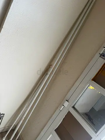 Stylish Ceiling Mounted Pipe System for Modern Spaces