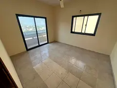 Ajman Corniche, second row, two-bedroom apartment, near the ship roundabout 2 bathrooms with a balco