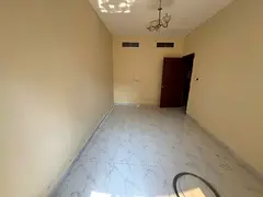 For annual rent, a very distinguished location, a two-bedroom apartment with a hall, Al Rashidiya 3,