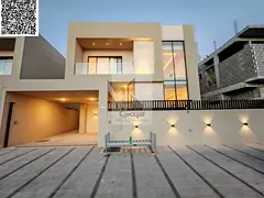 Luxury villa for sale in Ajman, including registration fees.
