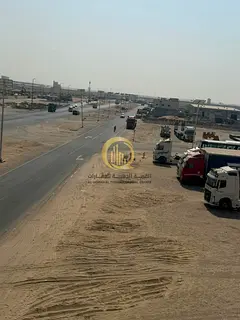 Industrial land for sale in Al-Sajaa, corner plot with an excellent location, freehold ownership for