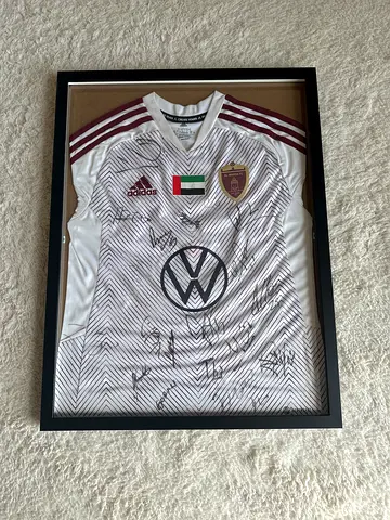 Framed Autographed Soccer Jersey - A Collectors Dream!