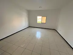 For annual rent, a large studio in Al Rashidiya, Old Muroor Street, behind the Grand Mall