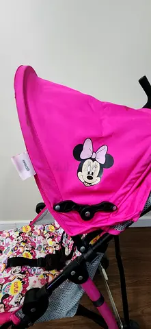 Charming Minnie Mouse Stroller for Your Little One!