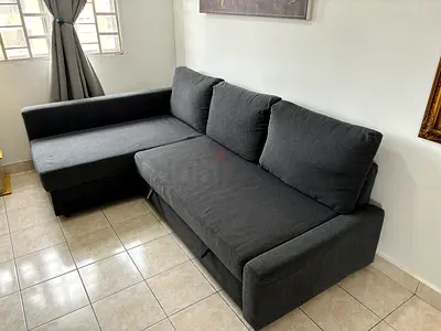 L shape sofa com bed storage very good condition