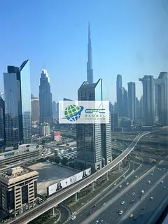 Fully Furnished &amp; All Utilities Included | Stunning Office with Burj Khalifa &amp; SZR Views | D