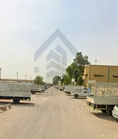 For sale in Industrial Area 6, Sharjah, 4 plots with Warehouses, area 30,000 square feet, rented