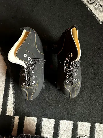 Roller skates with safety equipment and helmet