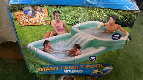 Beat the Heat with this Giant Family Pool with Slide!