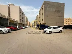For sale: a plot of land in Mouilah Commercial, corner location, excellent site, very close to Al Ja