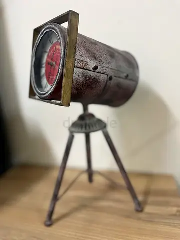 Vintage iron tripod clock