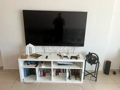 Sleek 65-inch Samsung TV with Accessories - Perfect for Your Home Setup!