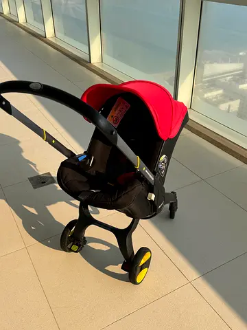 Doona car seat and stloller Red for Sale