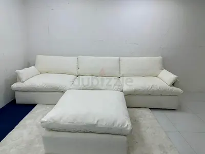 White color feather filled sofa