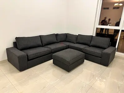 Ikea Kivik corner sofa with ottoman dark gray