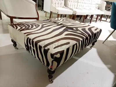 The one, zebra printed cowhide Ottoman , free delivery