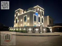Corner villa for sale in Al Amrah area, Ajman. Modern design, ground floor, first floor, and roof. T